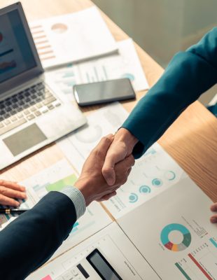 business,people,shaking,hands,end,of,meeting,,business,etiquette,,merger